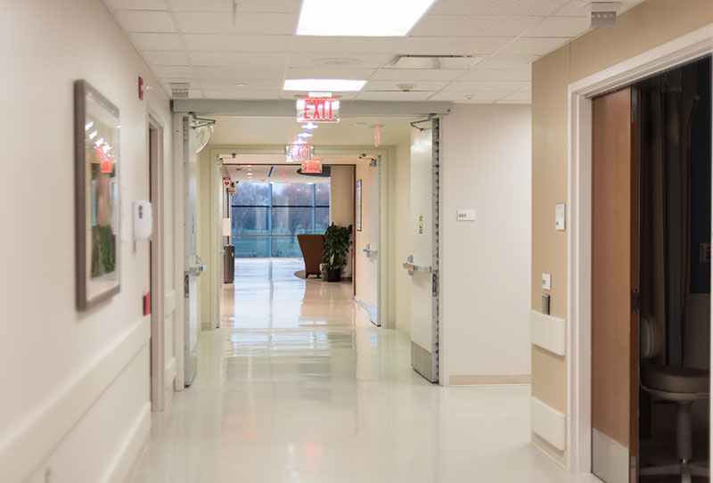 a hospital hallway with LED lighting