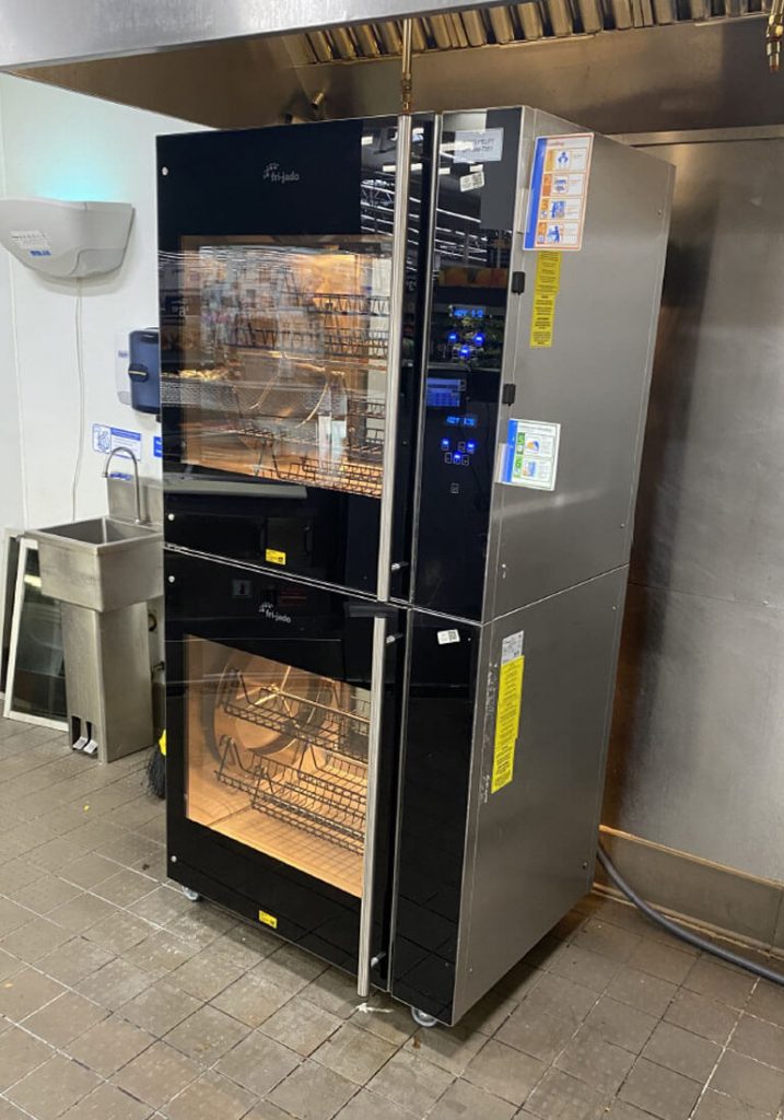 Double commercial oven that has been installed into a kitchen facility area